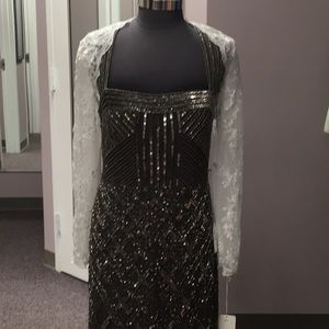 Alfred Angelo lace sleeve with keyhole back. Ivory